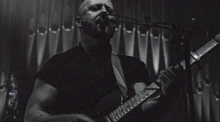 Man holding guitar